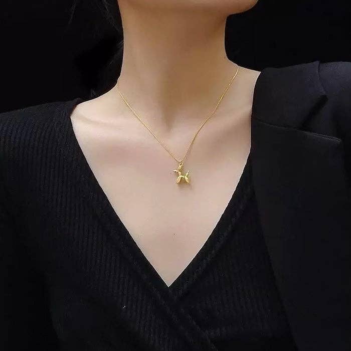 Gold and pearl drop earrings In UK