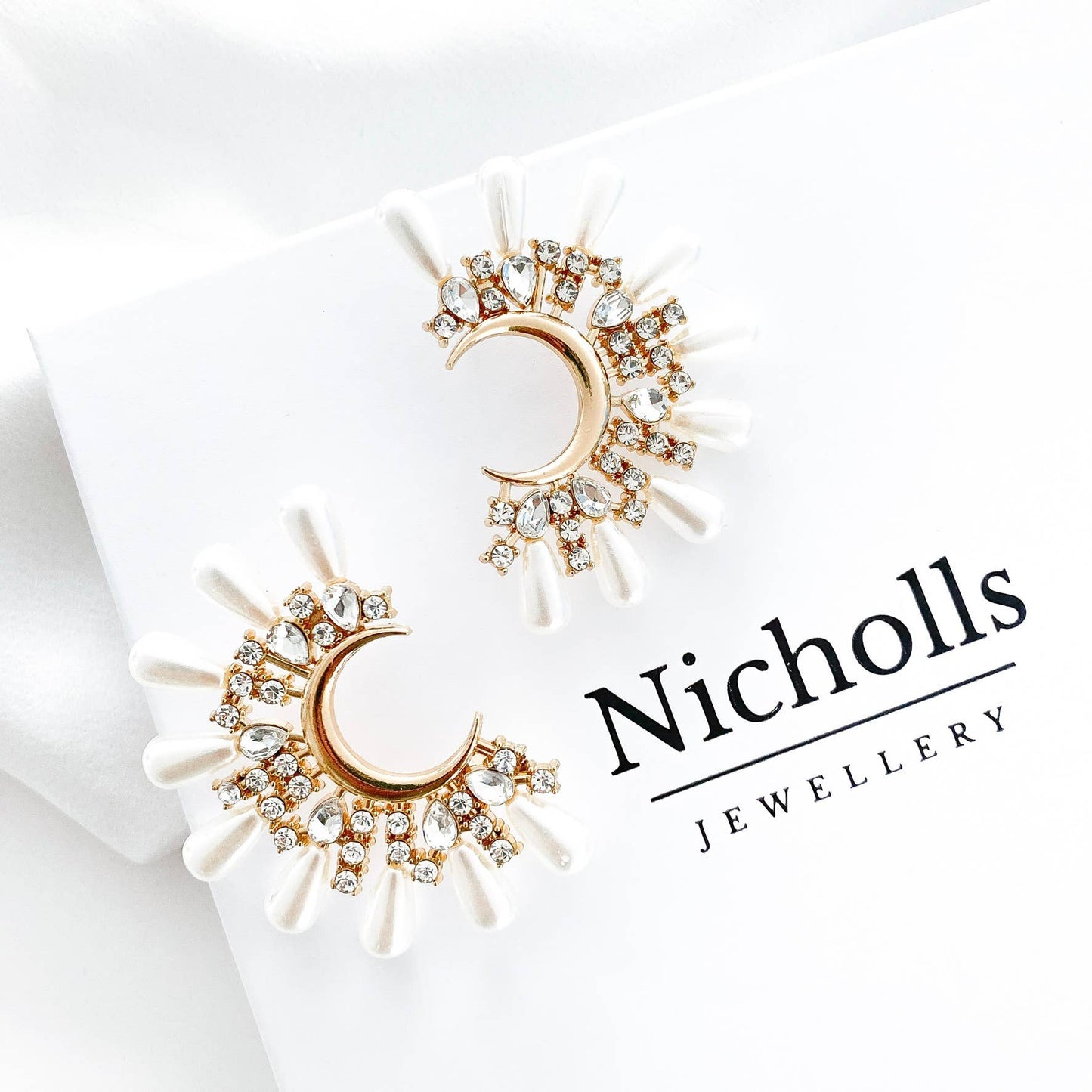 Supernova Half Moon Crystal Pearl Statement earrings