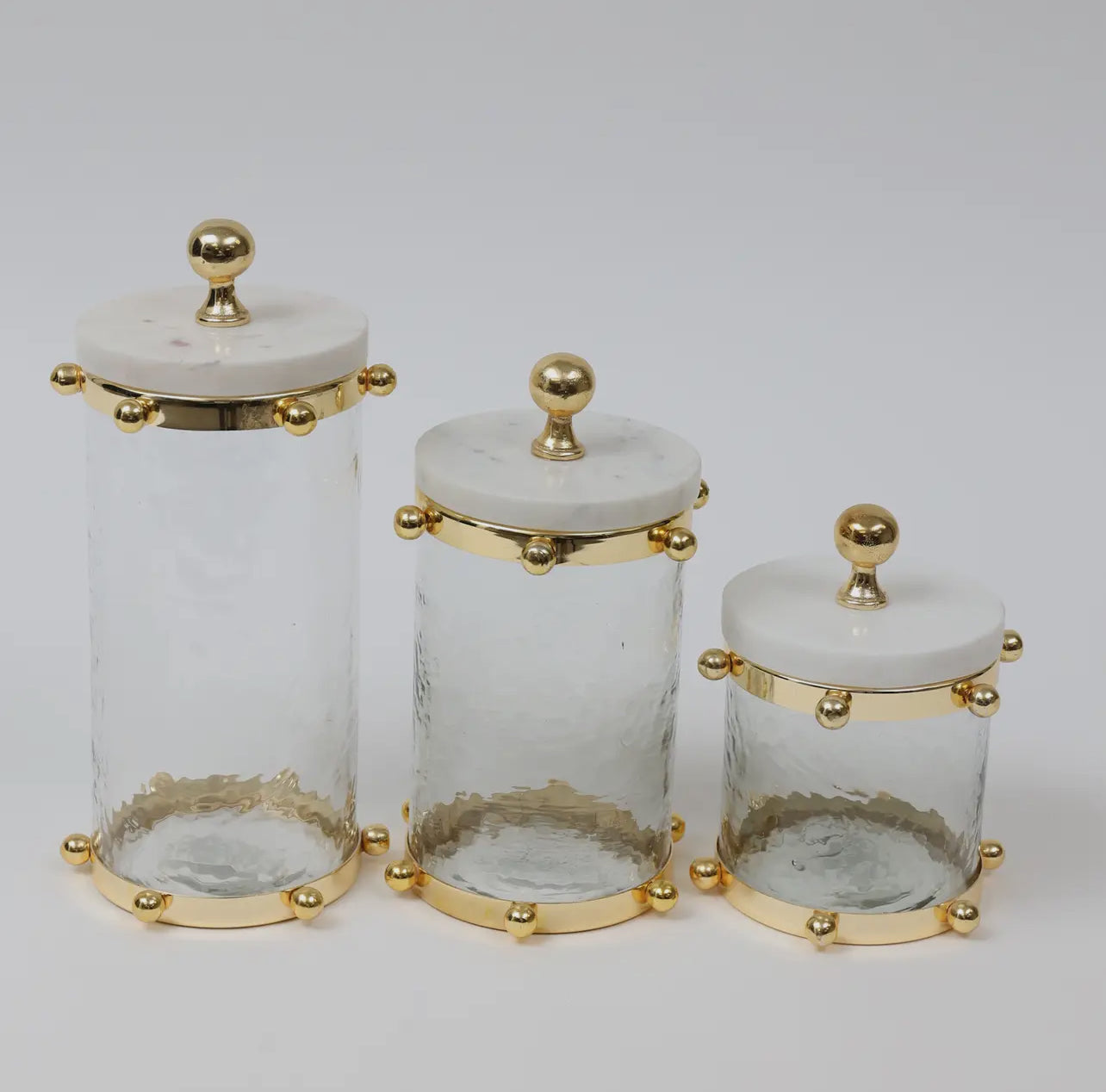 Hammered Glass Canister With Gold Ball Design And Marble Lid