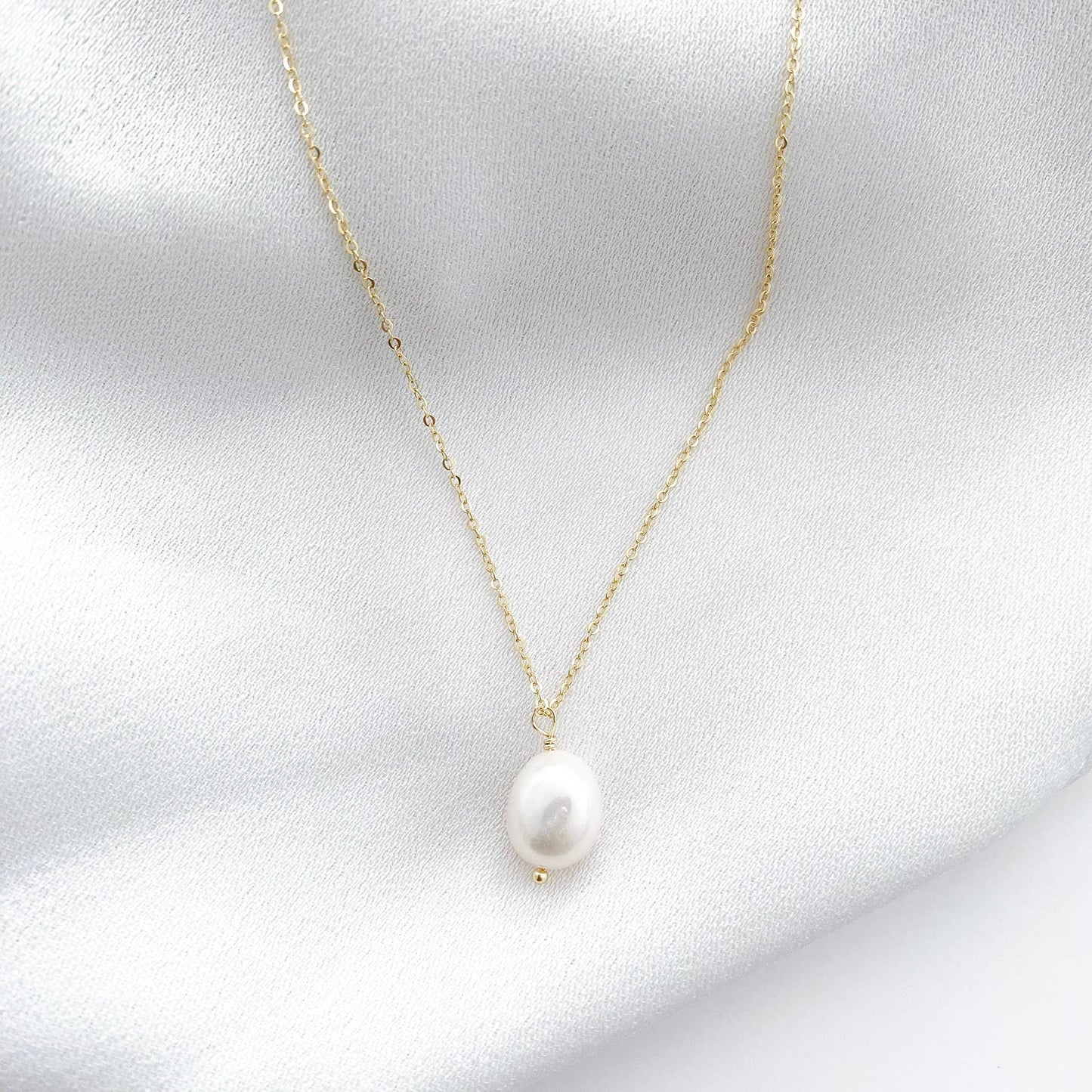 Delicate Drop Pearl Earrings and Necklace set in Gold